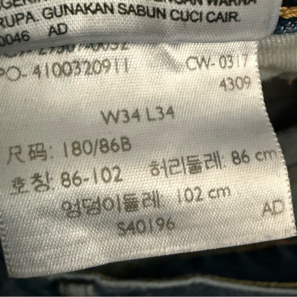 2017 Levi’s 502 Regular Fit Tapered Leg Raw Hem Size 34 - Picture 6 of 9